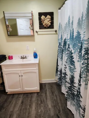 a room with a walk in closet and a window