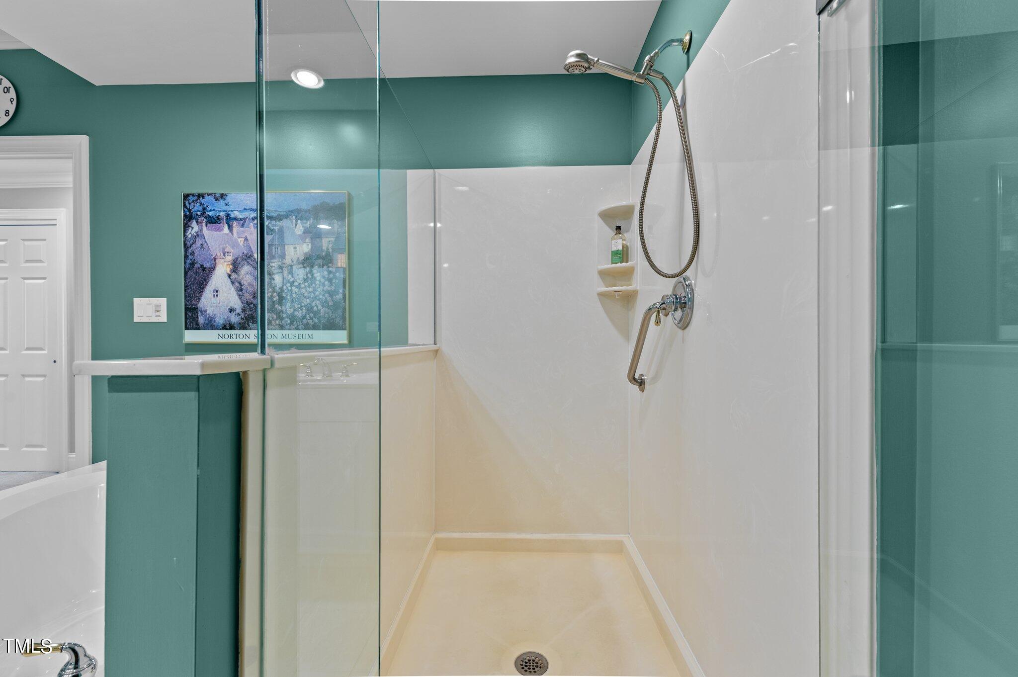 3700 Baron Cooper Pass, Unit 202 Raleigh, NC 27612 - Photo 34 of 49 a bathroom with a shower