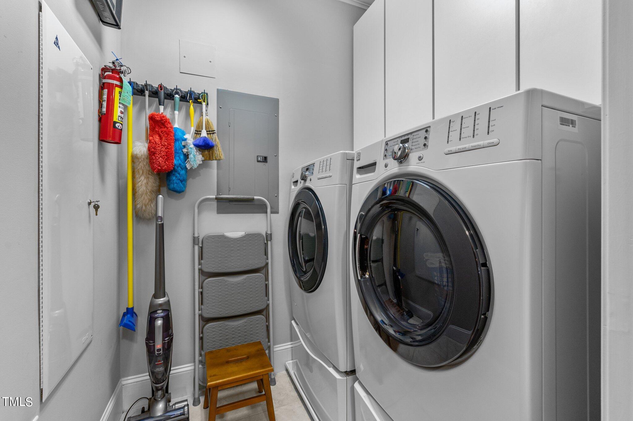 3700 Baron Cooper Pass, Unit 202 Raleigh, NC 27612 - Photo 39 of 49 a view of walk in closet with clothes and shoes