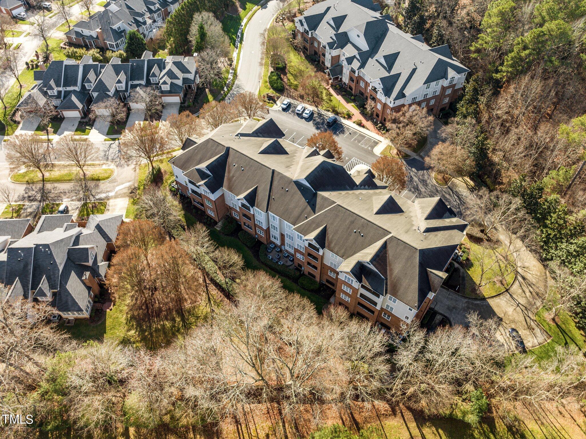 3700 Baron Cooper Pass, Unit 202 Raleigh, NC 27612 - Photo 4 of 49 front view of a house with a yard