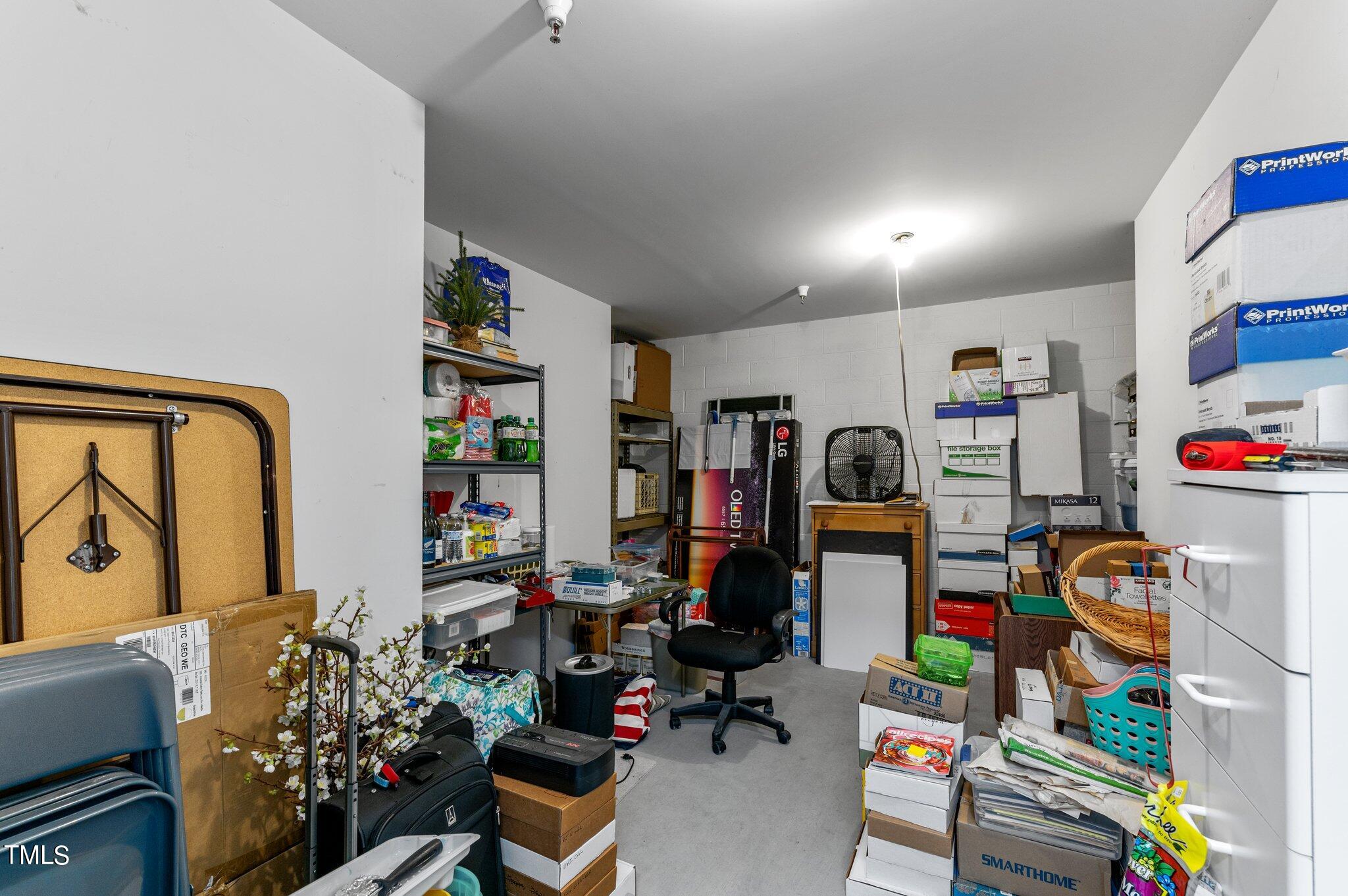 3700 Baron Cooper Pass, Unit 202 Raleigh, NC 27612 - Photo 40 of 49 a room with furniture and toys