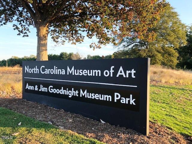 3700 Baron Cooper Pass, Unit 202 Raleigh, NC 27612 - Photo 46 of 49 a sign broad on the side of the road