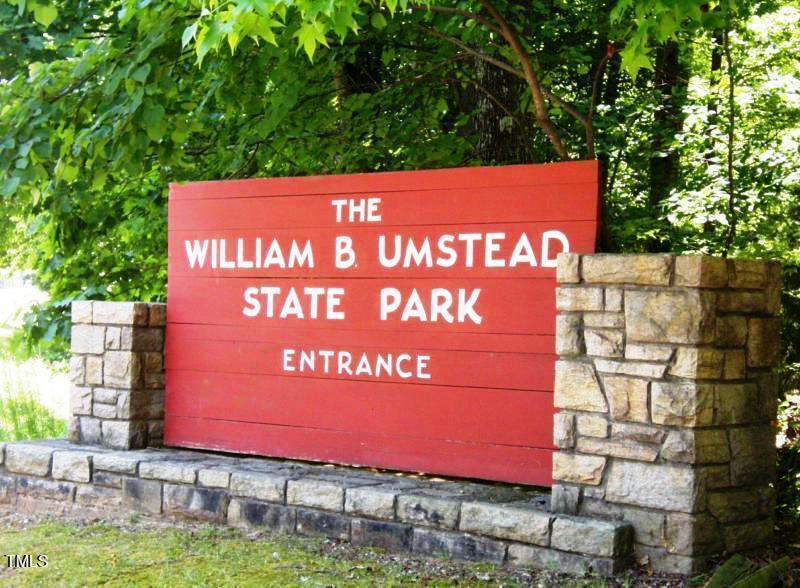 3700 Baron Cooper Pass, Unit 202 Raleigh, NC 27612 - Photo 48 of 49 a sign on the side of a building