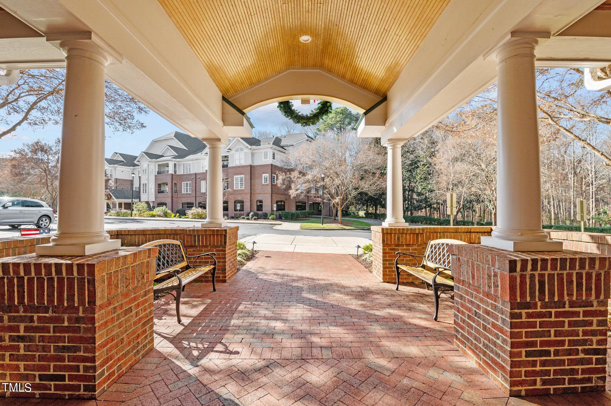 3700 Baron Cooper Pass, Unit 202 Raleigh, NC 27612 - Photo 7 of 49 a view of a patio with couches and pool table and chairs