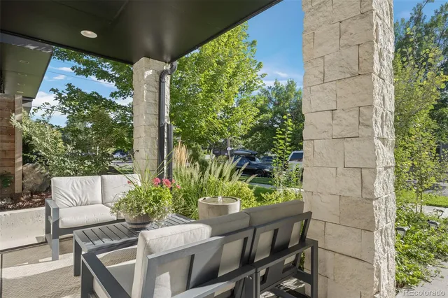 a view of a chairs and table in the patio