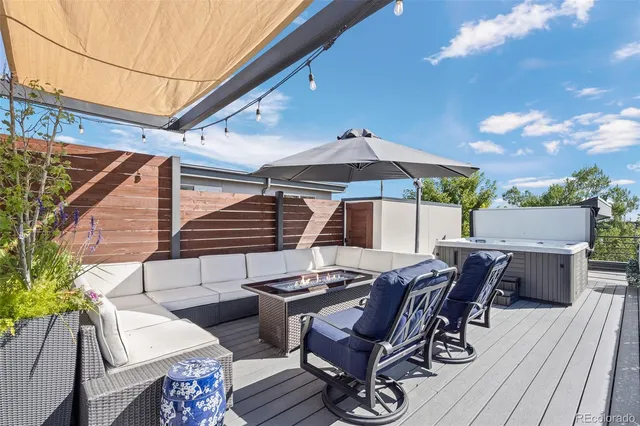 a view of a chairs and table in the patio