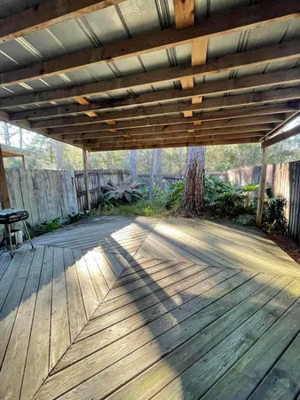 a view of a backyard of the house