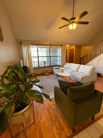 a room with furniture and a window