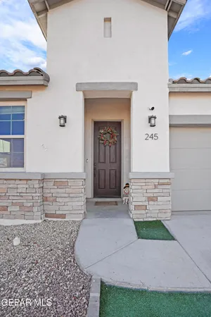 a front view of a house with outdoor space