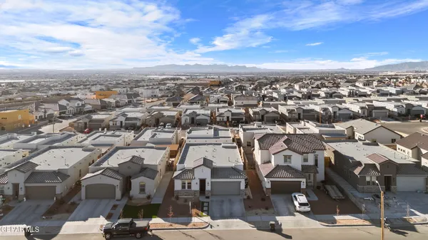 an aerial view of a city with lots of residential buildings