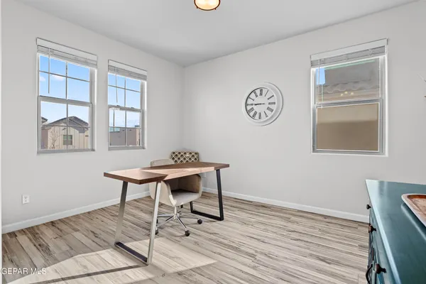 a workspace with wooden floor