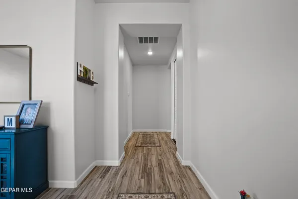 a view of a livingroom from a hallway