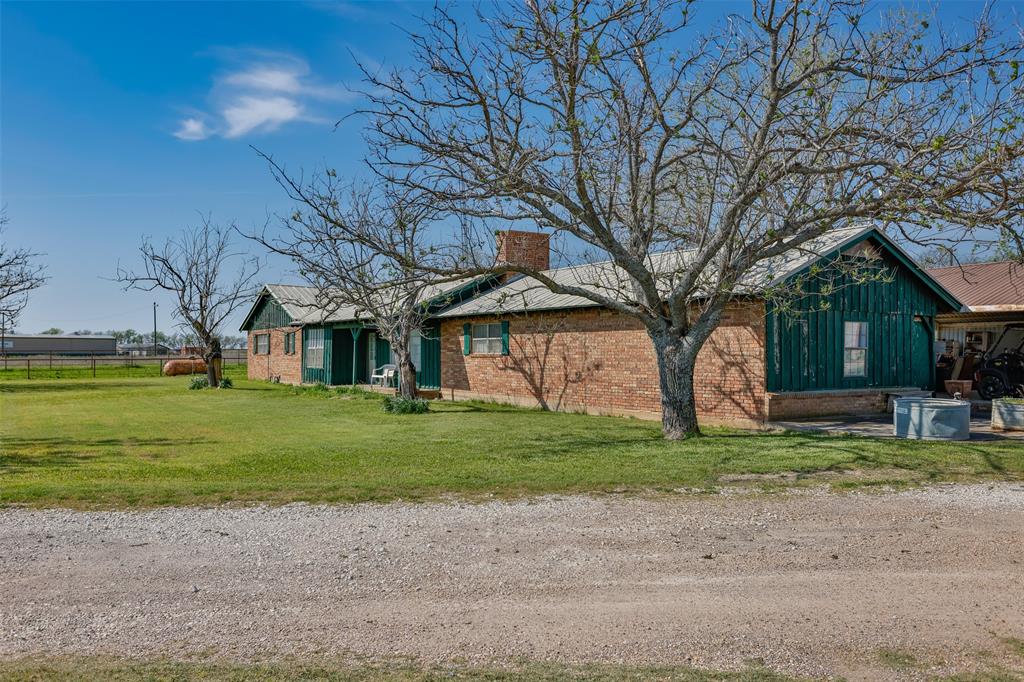 3511 Interstate 35 Gainesville, TX 76240 - Photo 12 of 40 a view of a house with a yard
