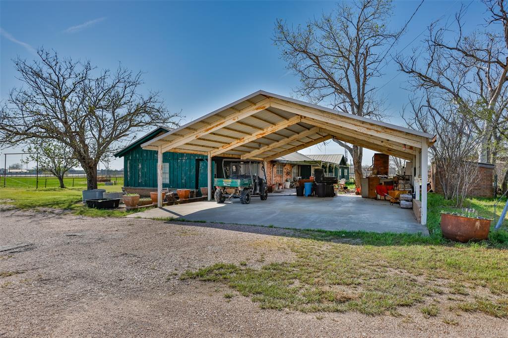 3511 Interstate 35 Gainesville, TX 76240 - Photo 13 of 40 a view of a house with a yard
