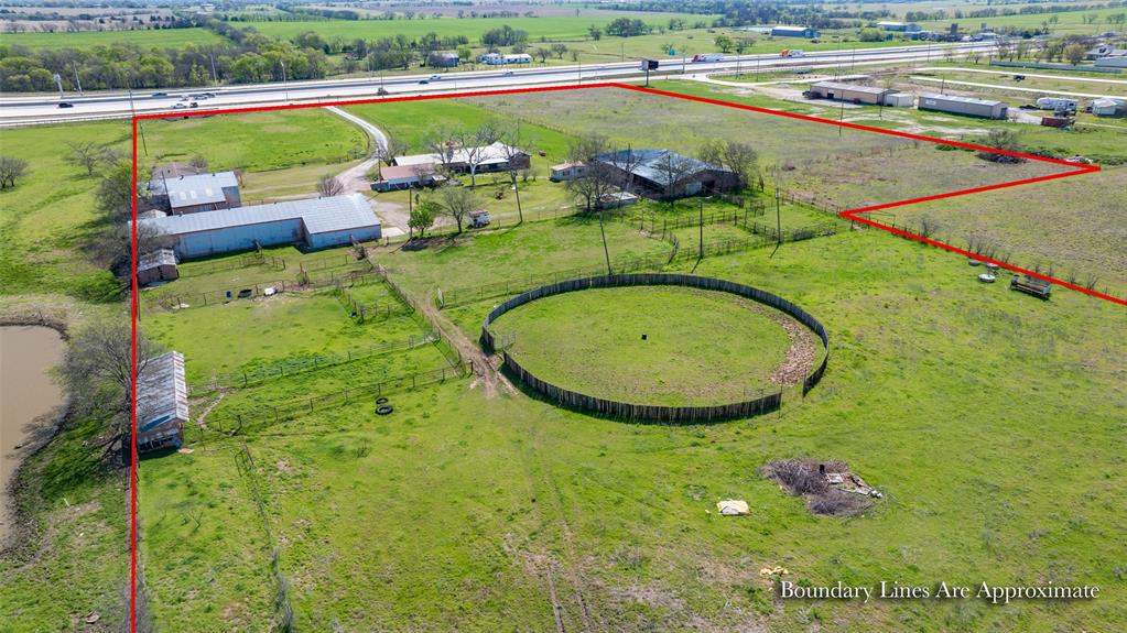 3511 Interstate 35 Gainesville, TX 76240 - Photo 6 of 40 a view of a swimming pool and outdoor seating