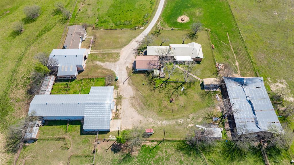 3511 Interstate 35 Gainesville, TX 76240 - Photo 9 of 40 an aerial view of a house with a swimming pool