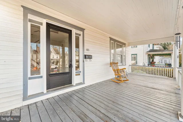 a view of outdoor space with deck and living room