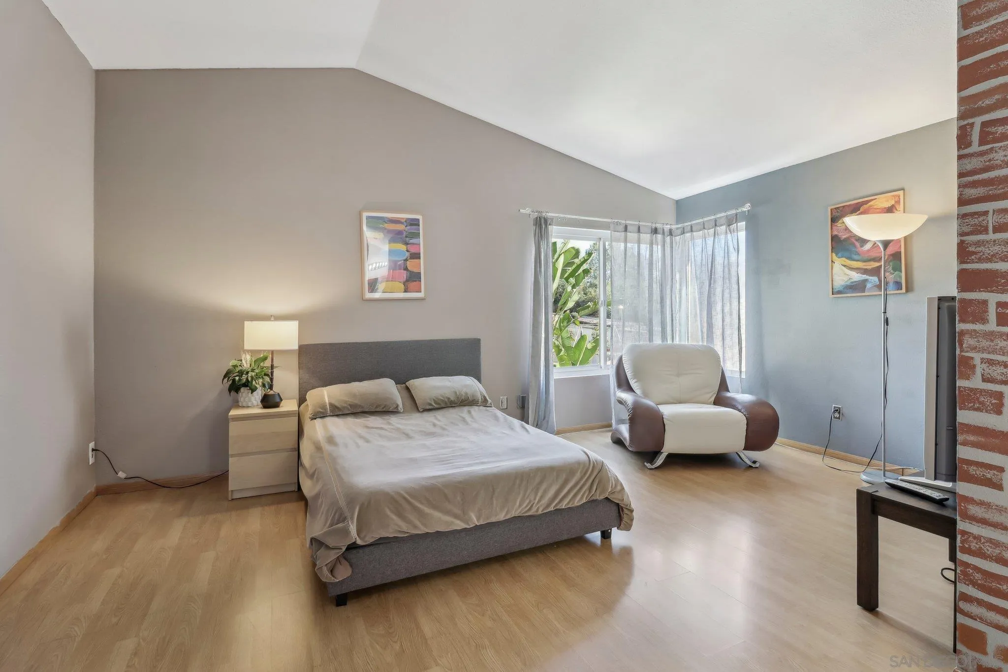 9186 Truman Street San Diego, CA 92129 - Photo 29 of 61 a bedroom with a bed and a couch