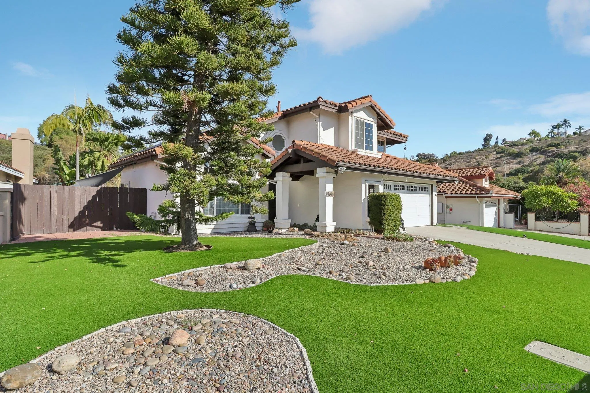 9186 Truman Street San Diego, CA 92129 - Photo 3 of 61 a view of outdoor space yard and front view of a house