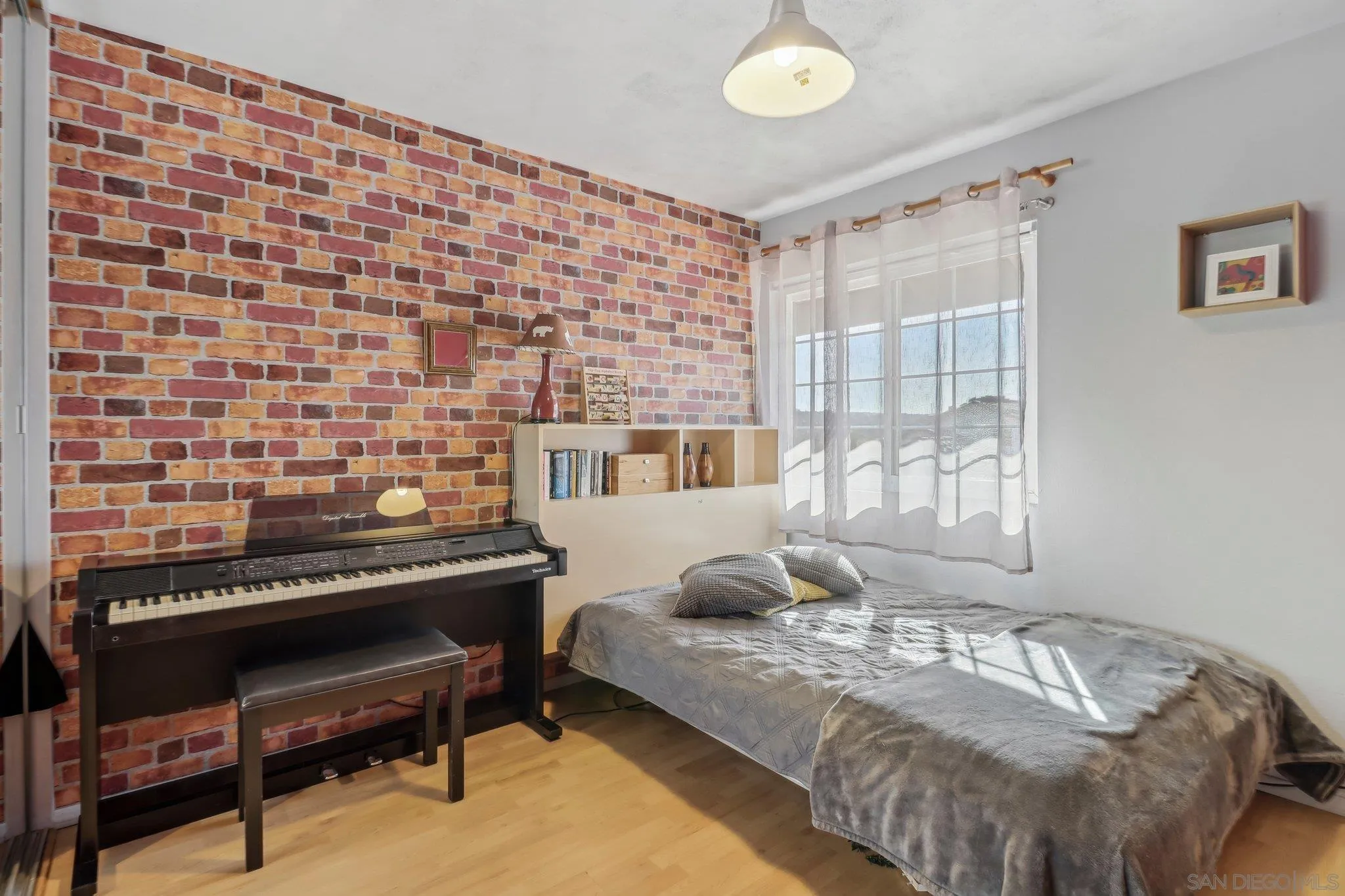 9186 Truman Street San Diego, CA 92129 - Photo 35 of 61 a bedroom with a bed and a window