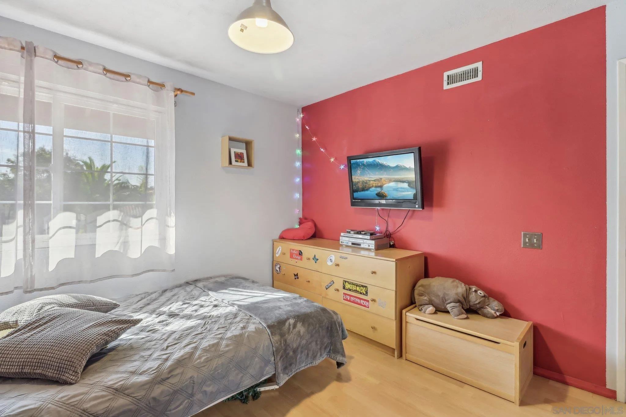 9186 Truman Street San Diego, CA 92129 - Photo 37 of 61 a bedroom with a bed and a window