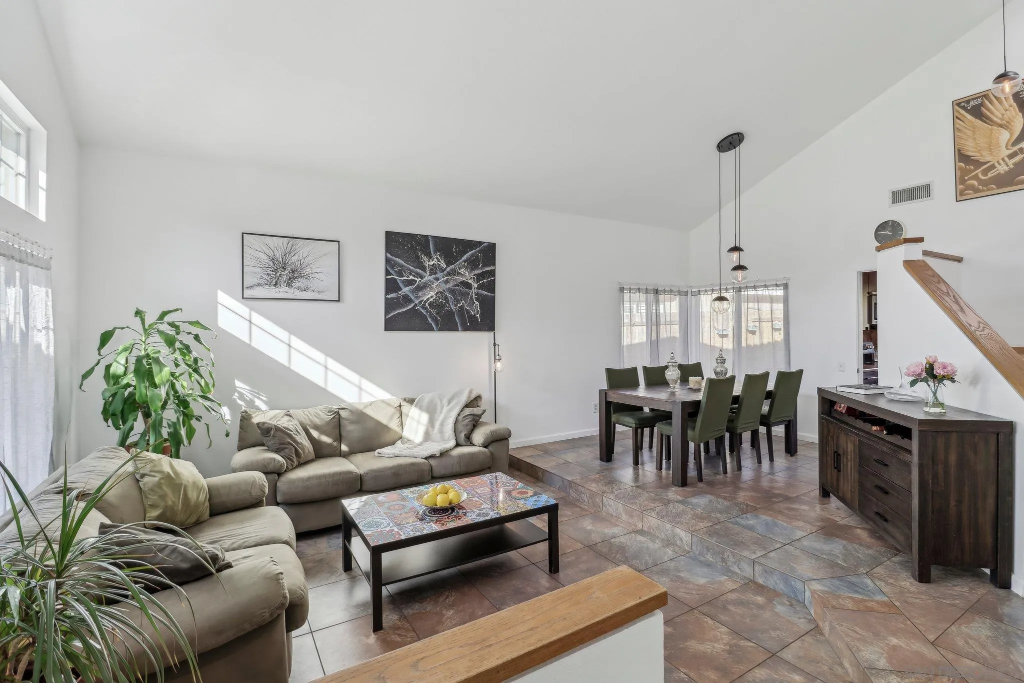 9186 Truman Street San Diego, CA 92129 - Photo 4 of 61 a living room with furniture and a dining area