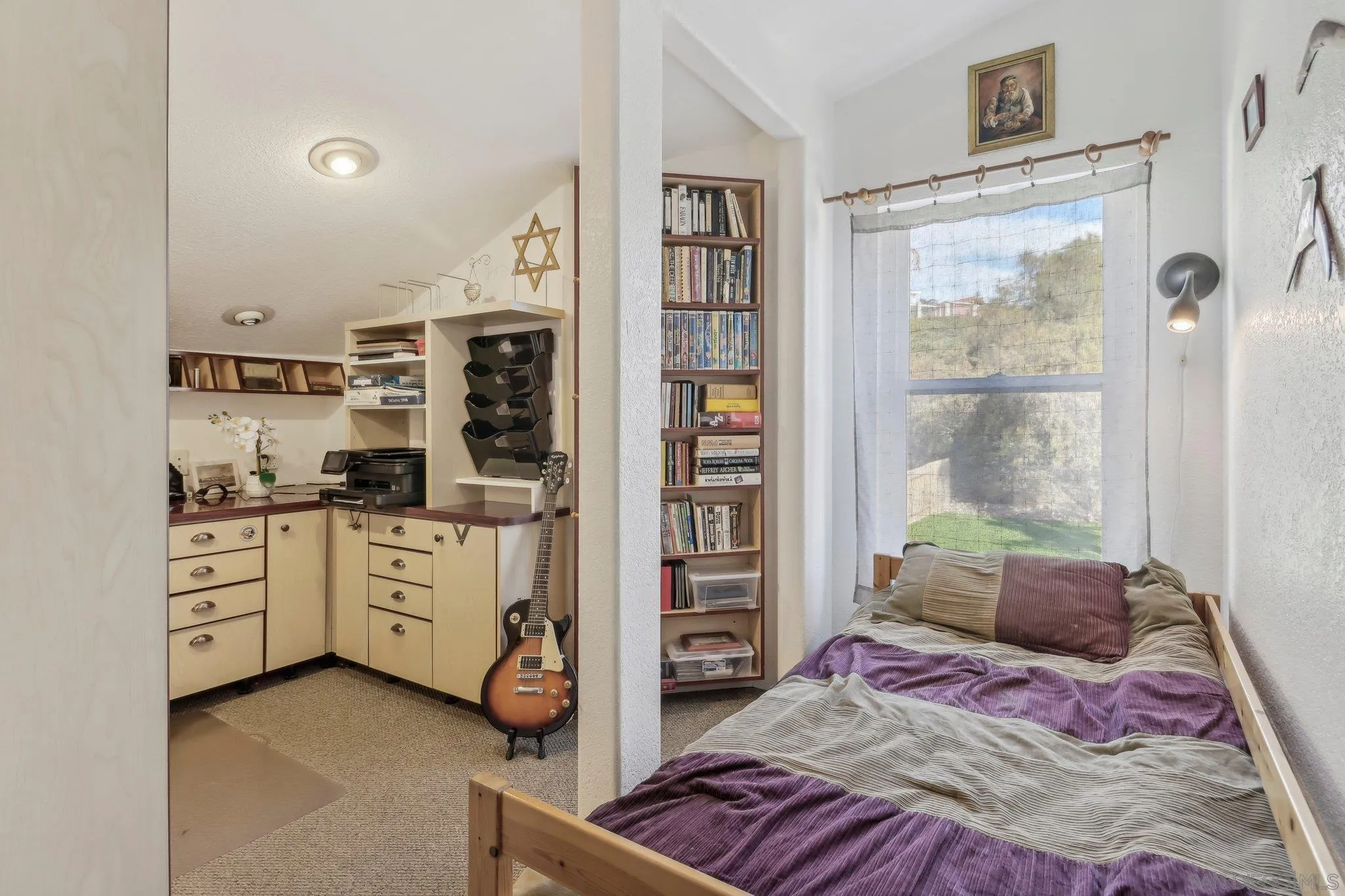 9186 Truman Street San Diego, CA 92129 - Photo 41 of 61 a bed room with a bed and a window