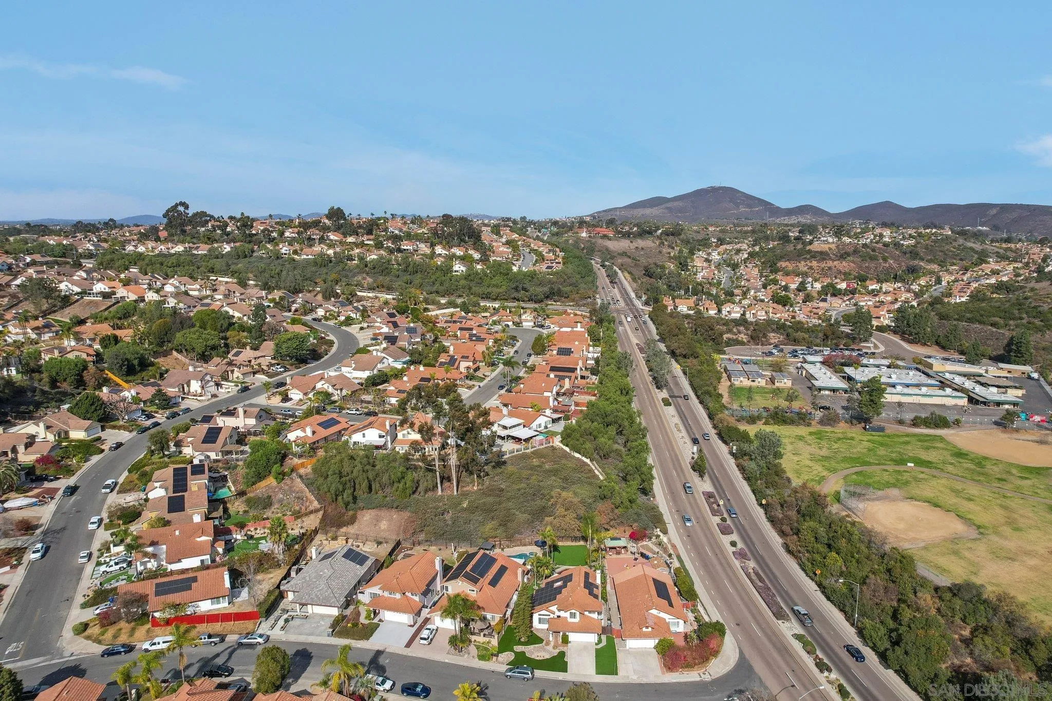 9186 Truman Street San Diego, CA 92129 - Photo 49 of 61 an aerial view of residential houses with outdoor space