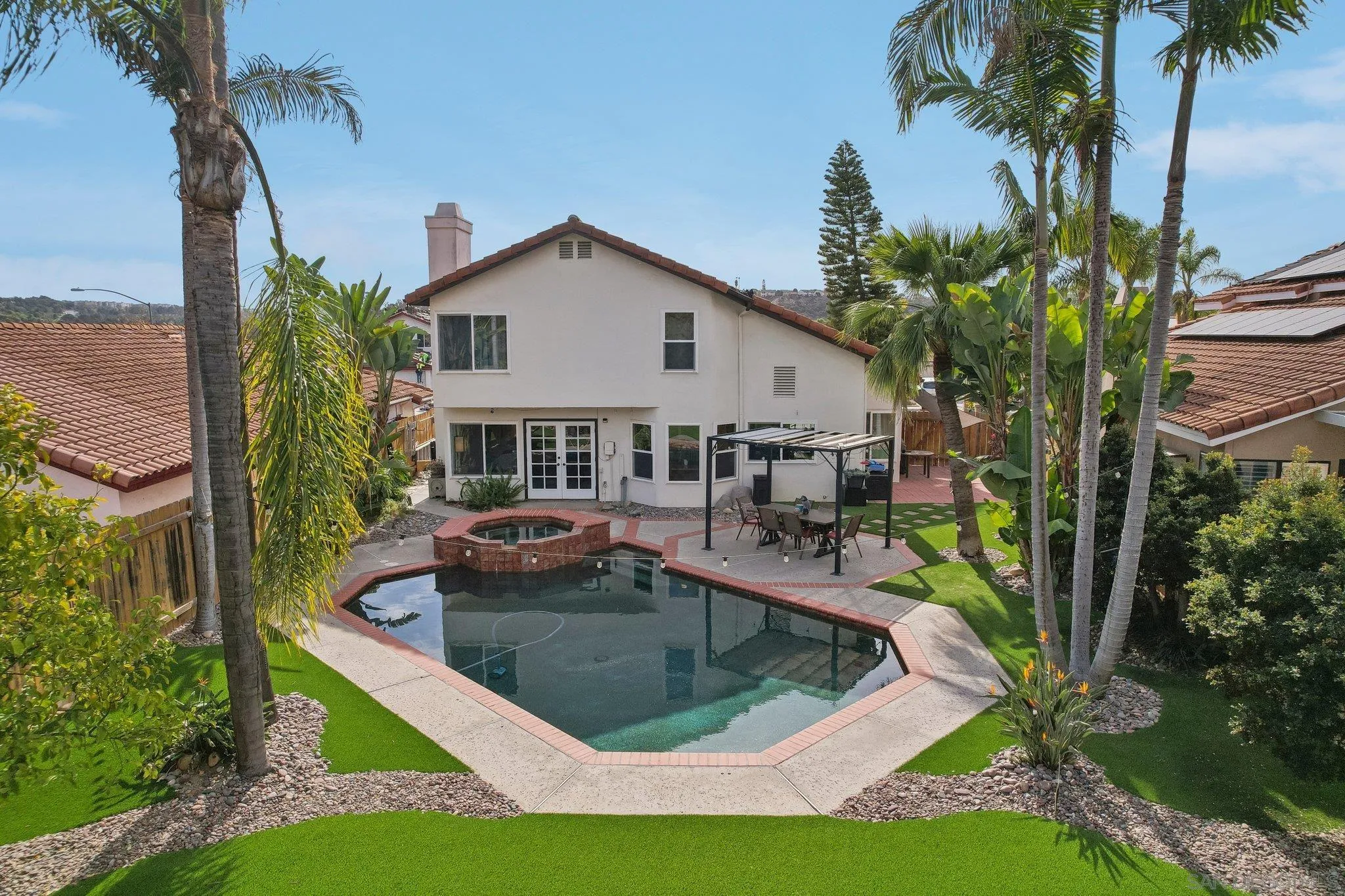 9186 Truman Street San Diego, CA 92129 - Photo 56 of 61 a front view of house with yard and outdoor seating