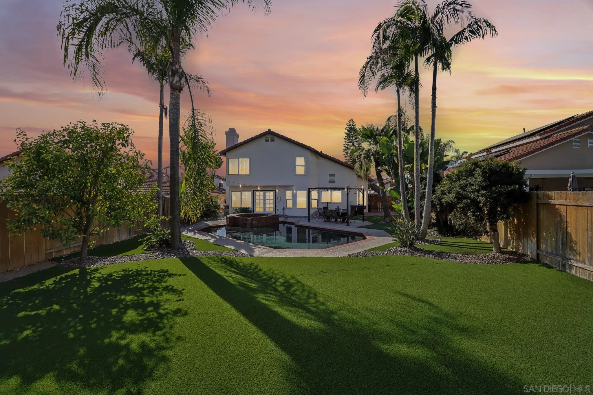 9186 Truman Street San Diego, CA 92129 - Photo 57 of 61 a view of a house with swimming pool and a big yard