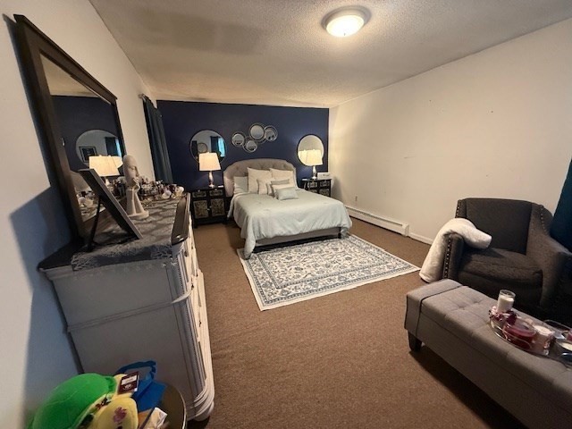 513-515 Whipple Street Fall River, MA 02724 - Photo 14 of 41 a bedroom with furniture and a couch