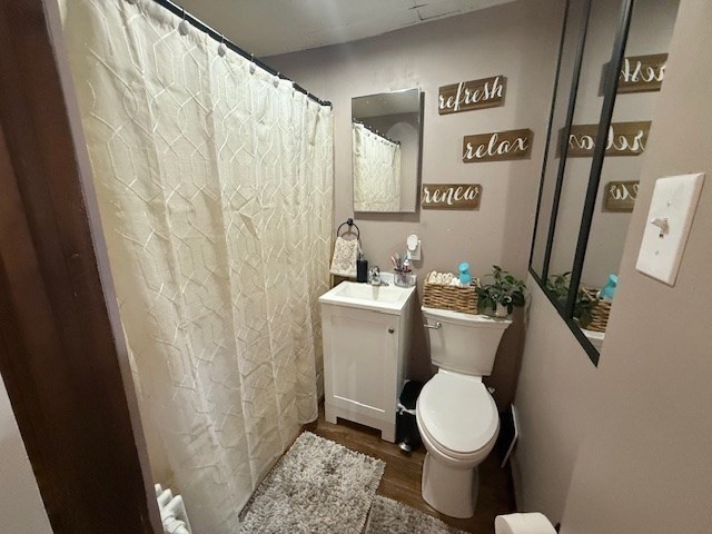513-515 Whipple Street Fall River, MA 02724 - Photo 19 of 41 a white toilet sitting next to a small sink