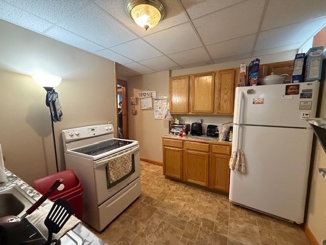 513-515 Whipple Street Fall River, MA 02724 - Photo 23 of 41 a kitchen with a refrigerator stove and microwave