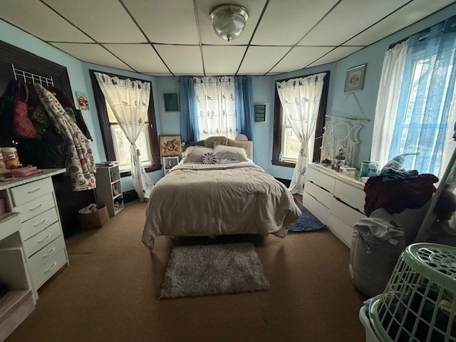 513-515 Whipple Street Fall River, MA 02724 - Photo 30 of 41 a spacious bedroom with a bed couch and a window