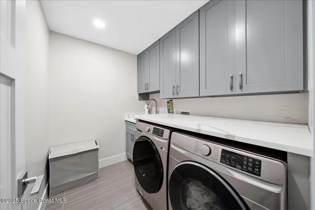 a bathroom with a sink and a window