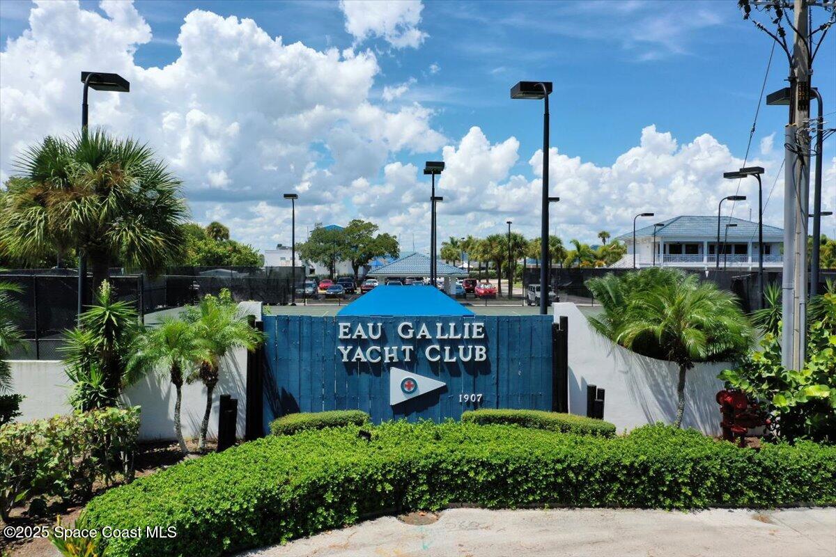 5685 Lake Washington Road Melbourne, FL 32934 - Photo 53 of 63 a view of a sign board with buildings in the background