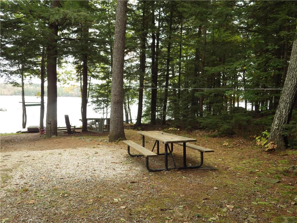 38-40 Blackberry Estates Rome, ME 04963 - Photo 17 of 23 Having a picnic at the waters edge.