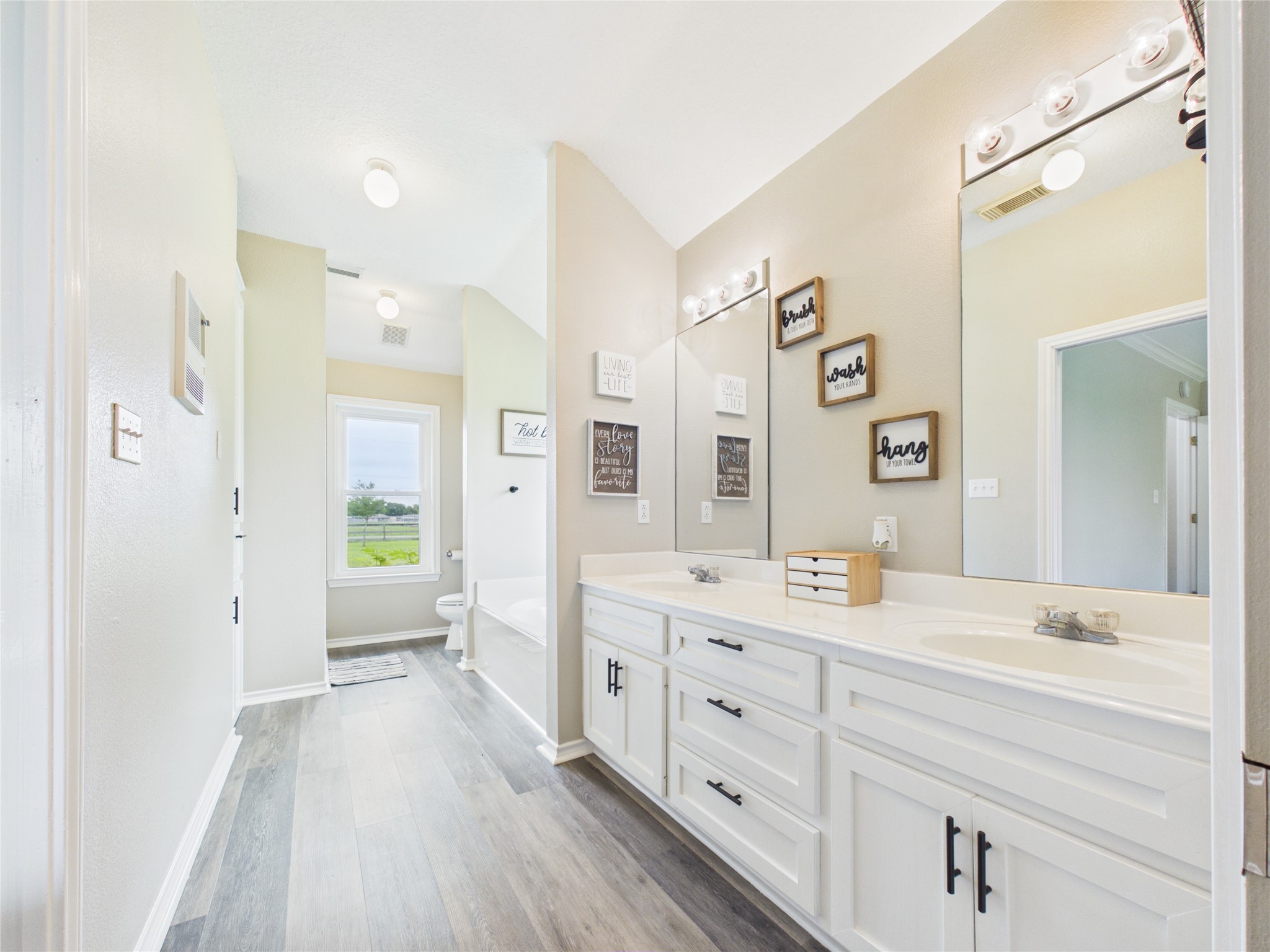 4610 Mustang Road Alvin, TX 77511 - Photo 32 of 50 Primary bathroom is generous in size and offers great storage and functionality
