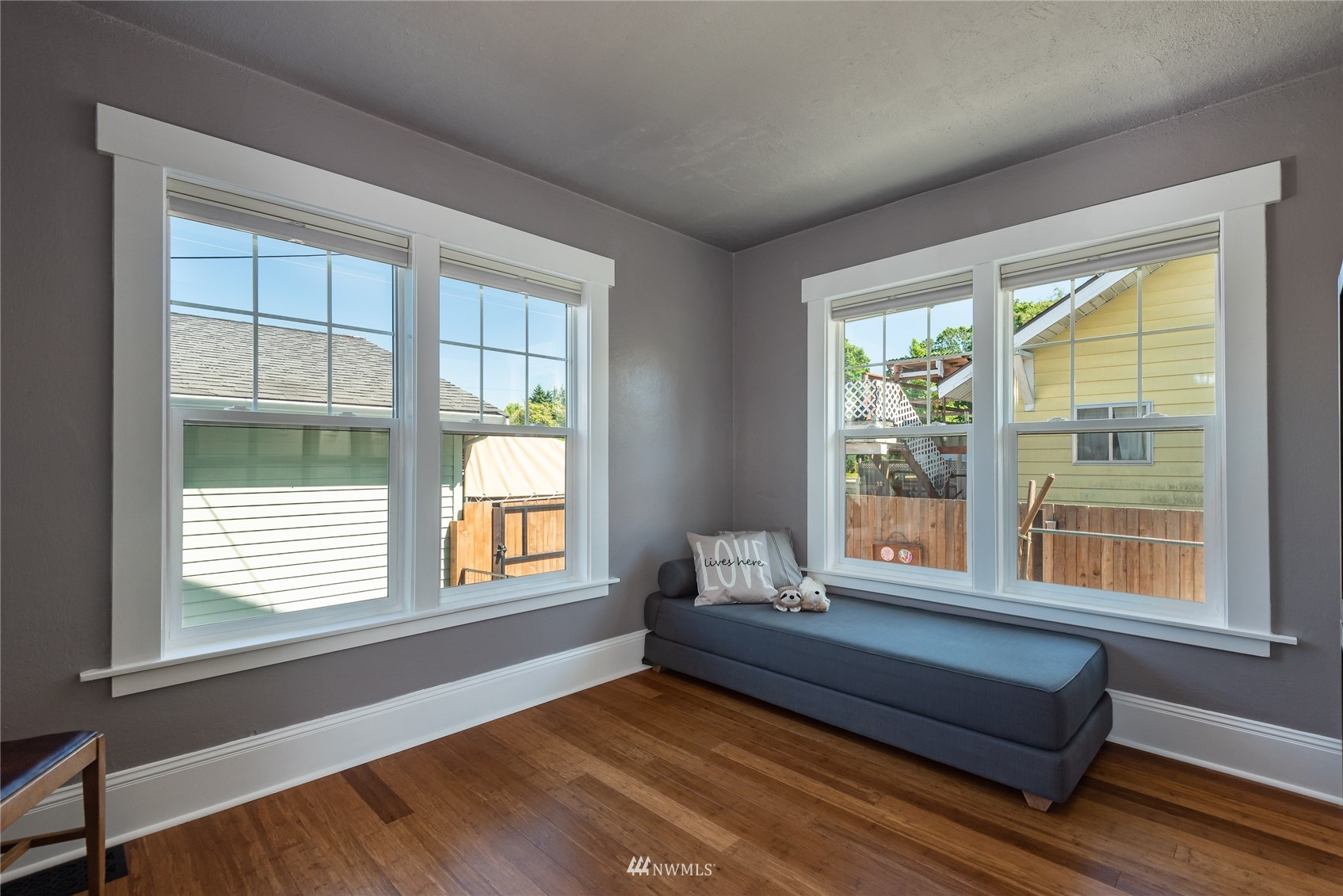 715 Sumner Avenue Sumner, WA 98390 - Photo 19 of 39 a living room with furniture and a window