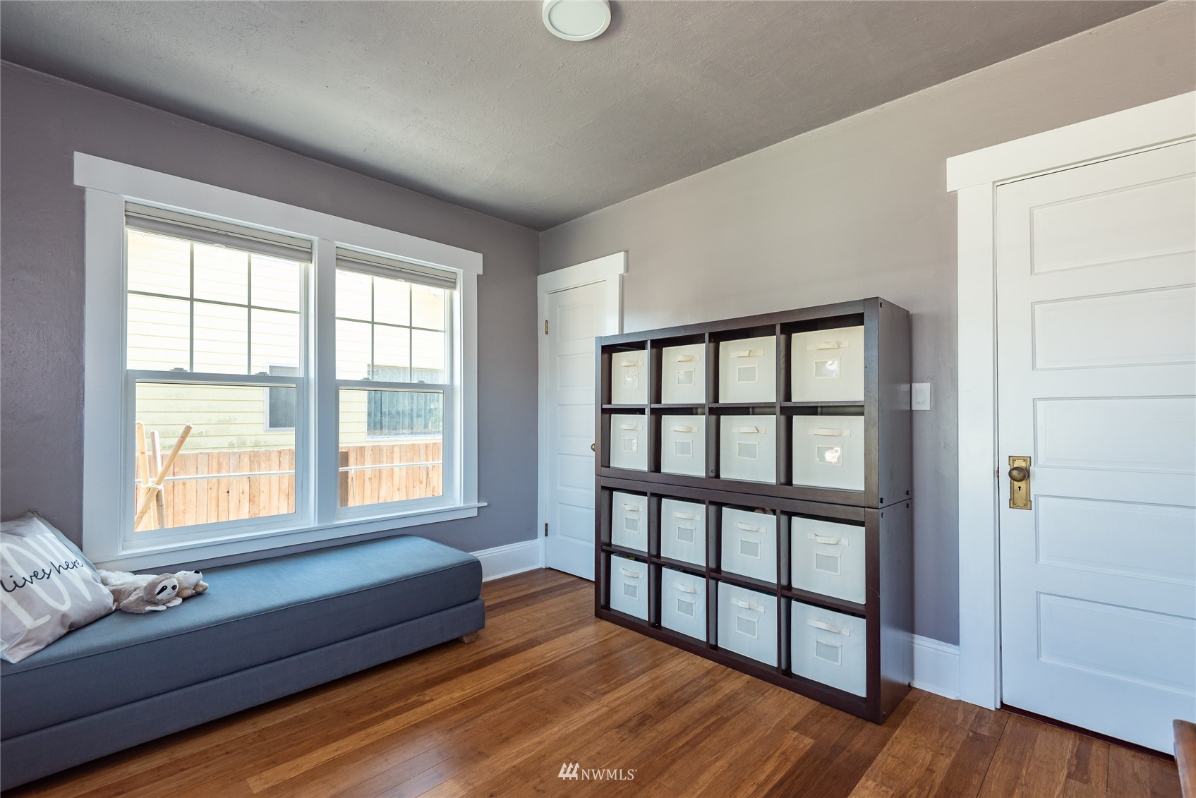 715 Sumner Avenue Sumner, WA 98390 - Photo 20 of 39 a living room with furniture and a window