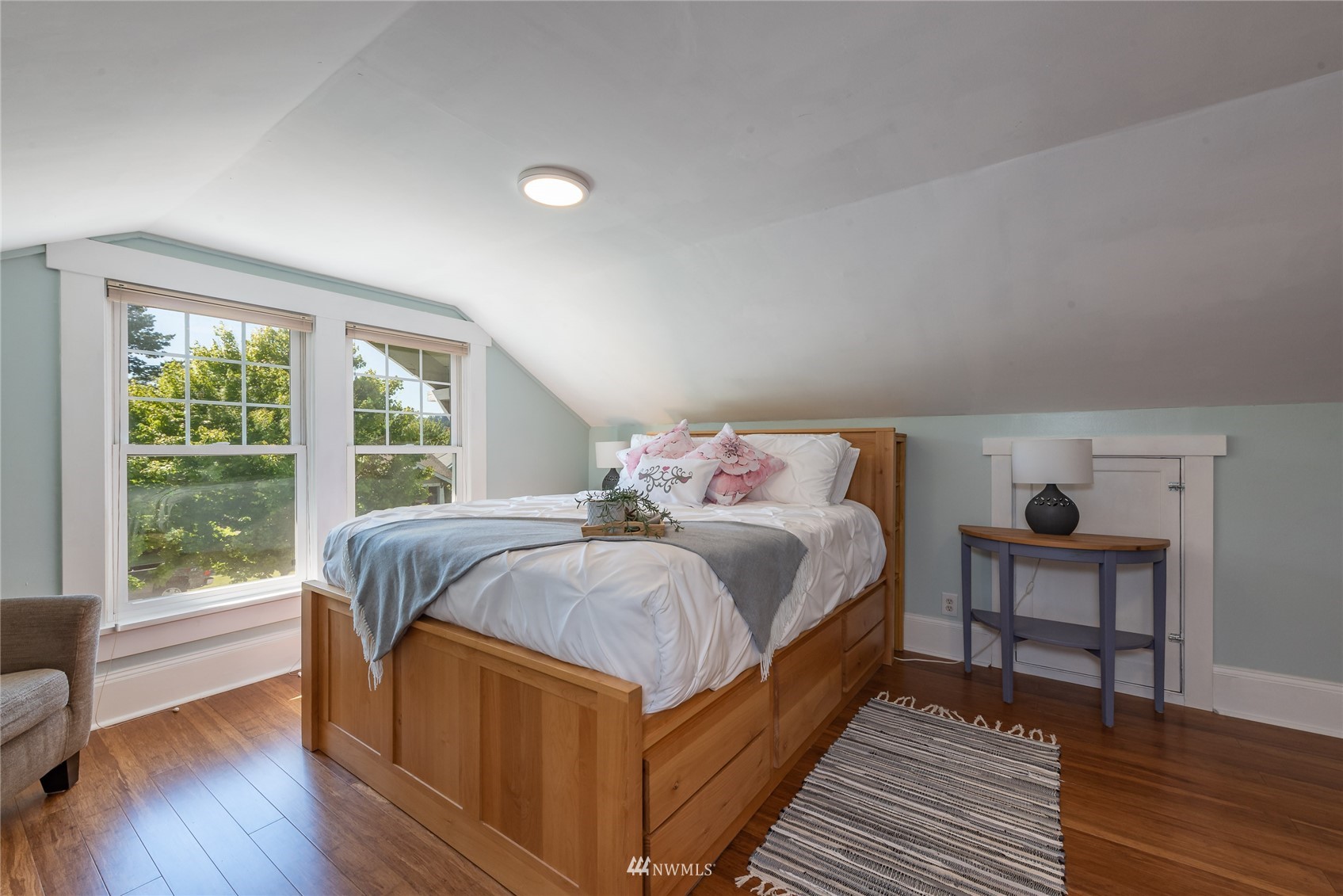 715 Sumner Avenue Sumner, WA 98390 - Photo 25 of 39 a bedroom with a bed and a large window