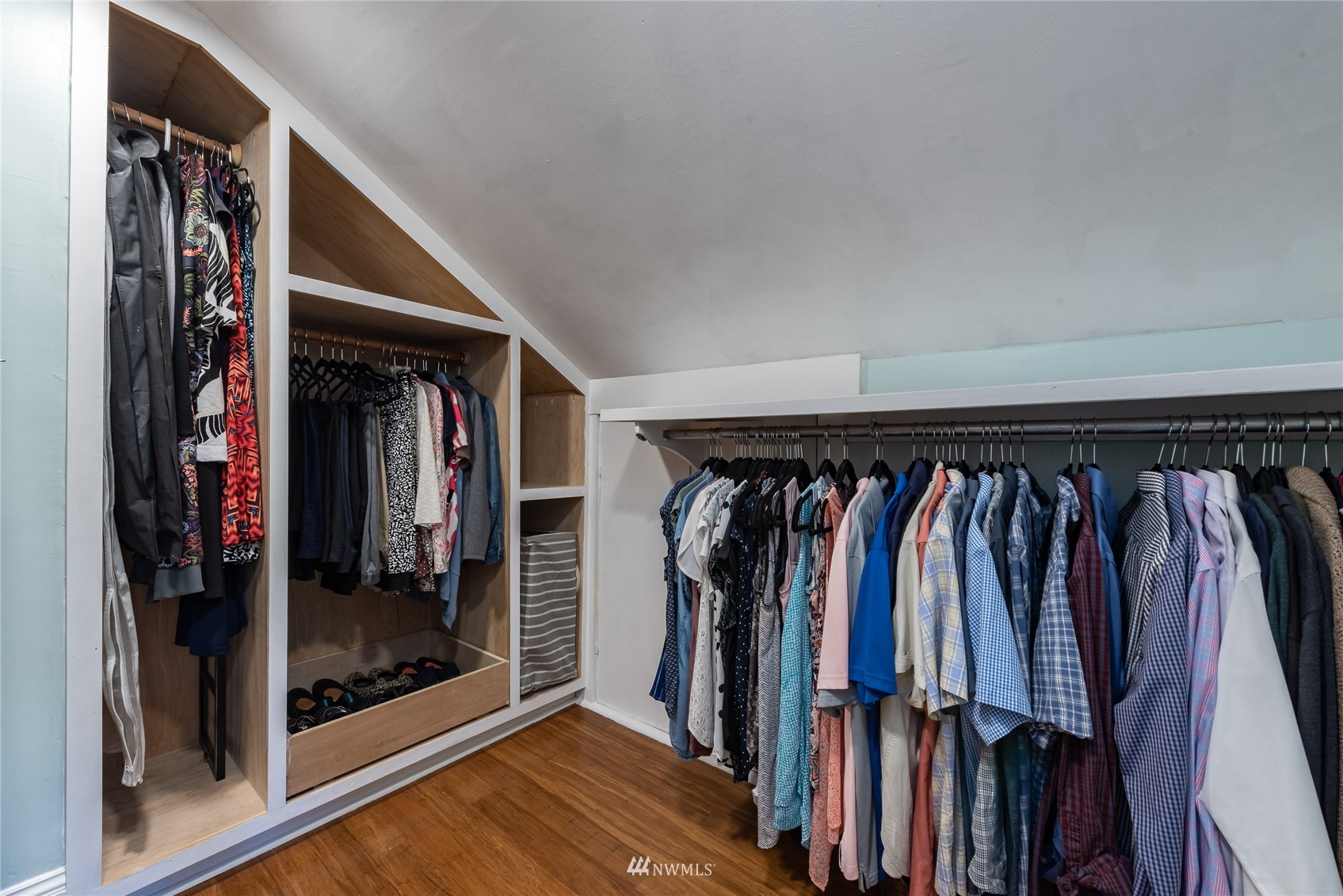 715 Sumner Avenue Sumner, WA 98390 - Photo 27 of 39 a view of walk in closet with clothes and shoes