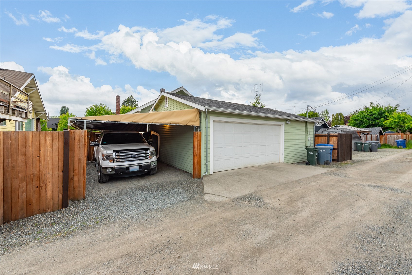 715 Sumner Avenue Sumner, WA 98390 - Photo 32 of 39 a view of a car in front of a house
