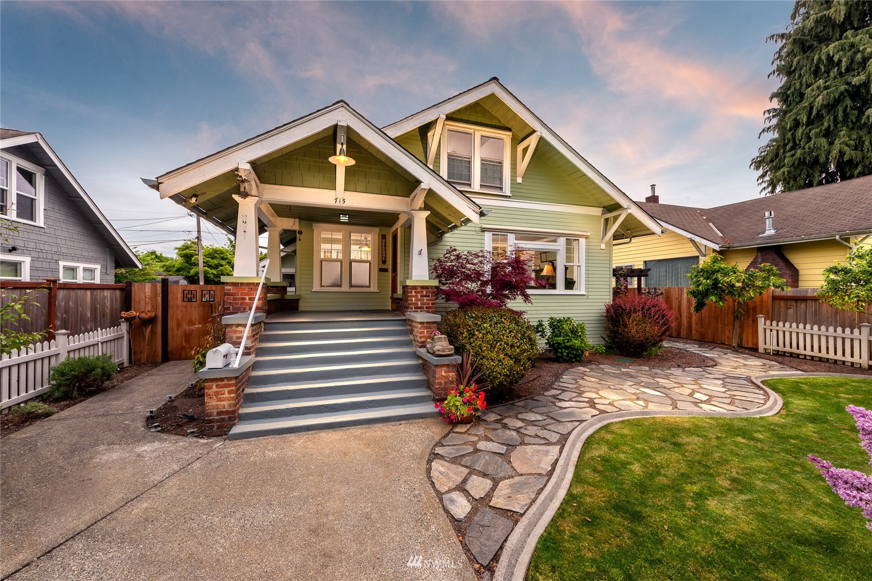 715 Sumner Avenue Sumner, WA 98390 - Photo 35 of 39 a front view of a house with a yard