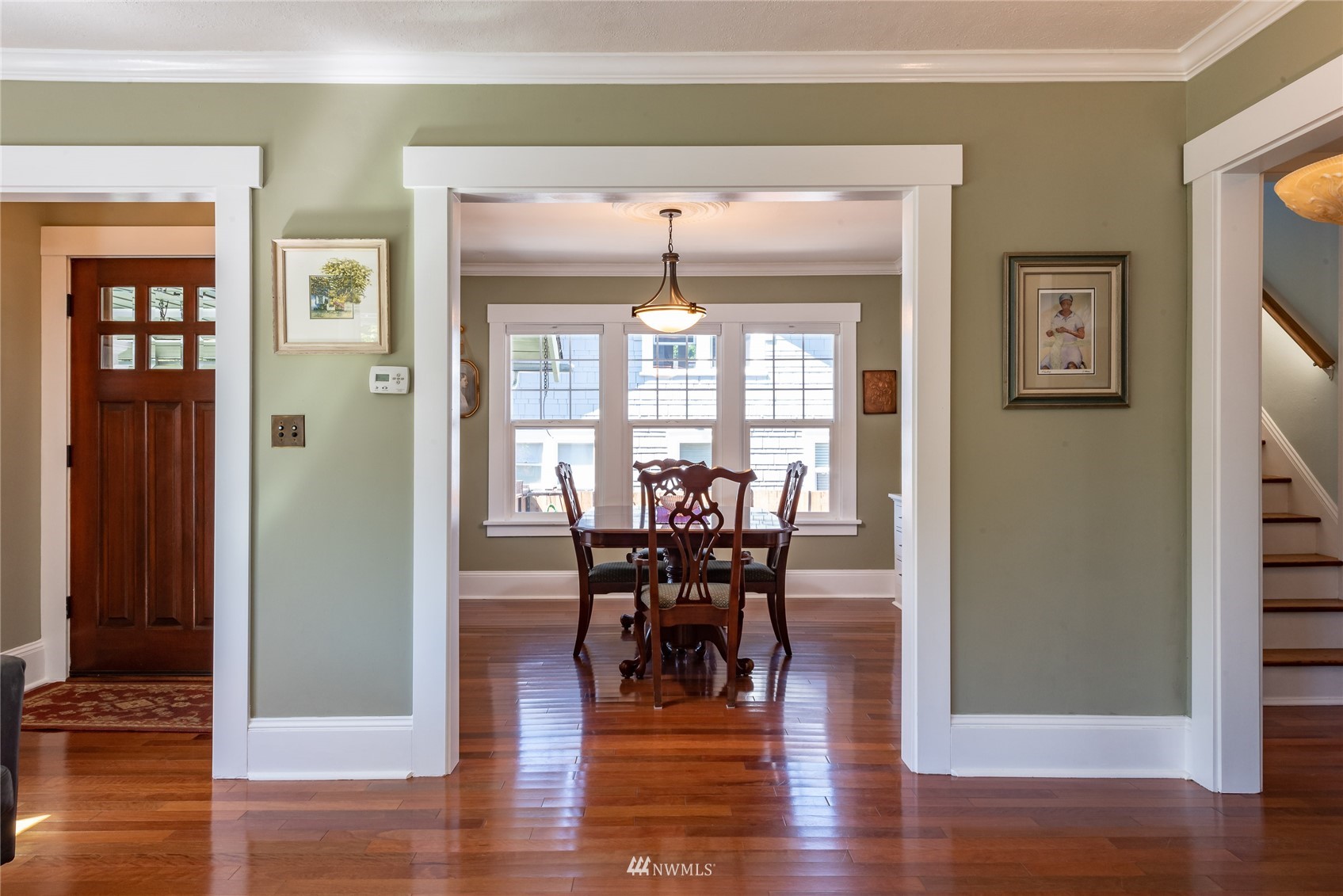 715 Sumner Avenue Sumner, WA 98390 - Photo 9 of 39 a view of a dining room with furniture window and wooden floor