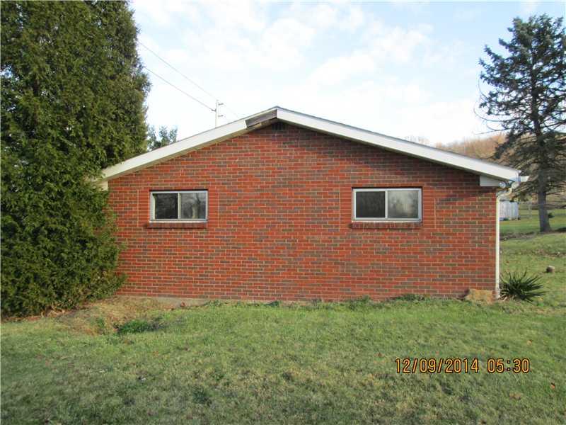 627 Pittsburgh Pike Ruffs Dale, PA 15679 - Photo 6 of 7 Exterior Back. Side View of yard and home