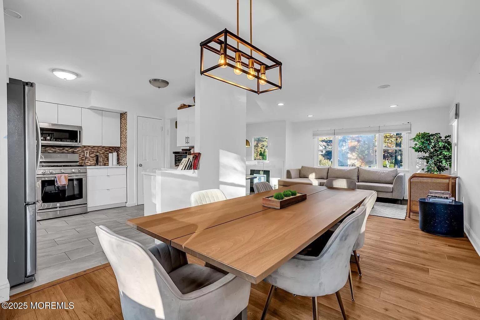 156 Belmar Avenue Oakhurst, NJ 07755 - Photo 8 of 19 a view of a dining room with furniture