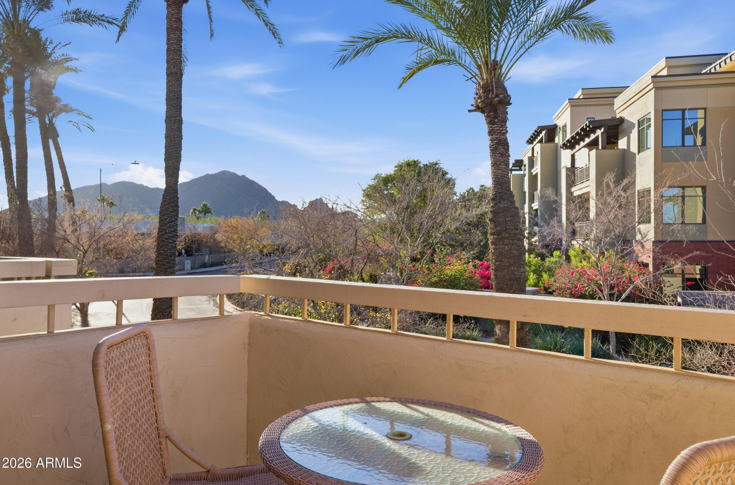 a view of balcony with furniture