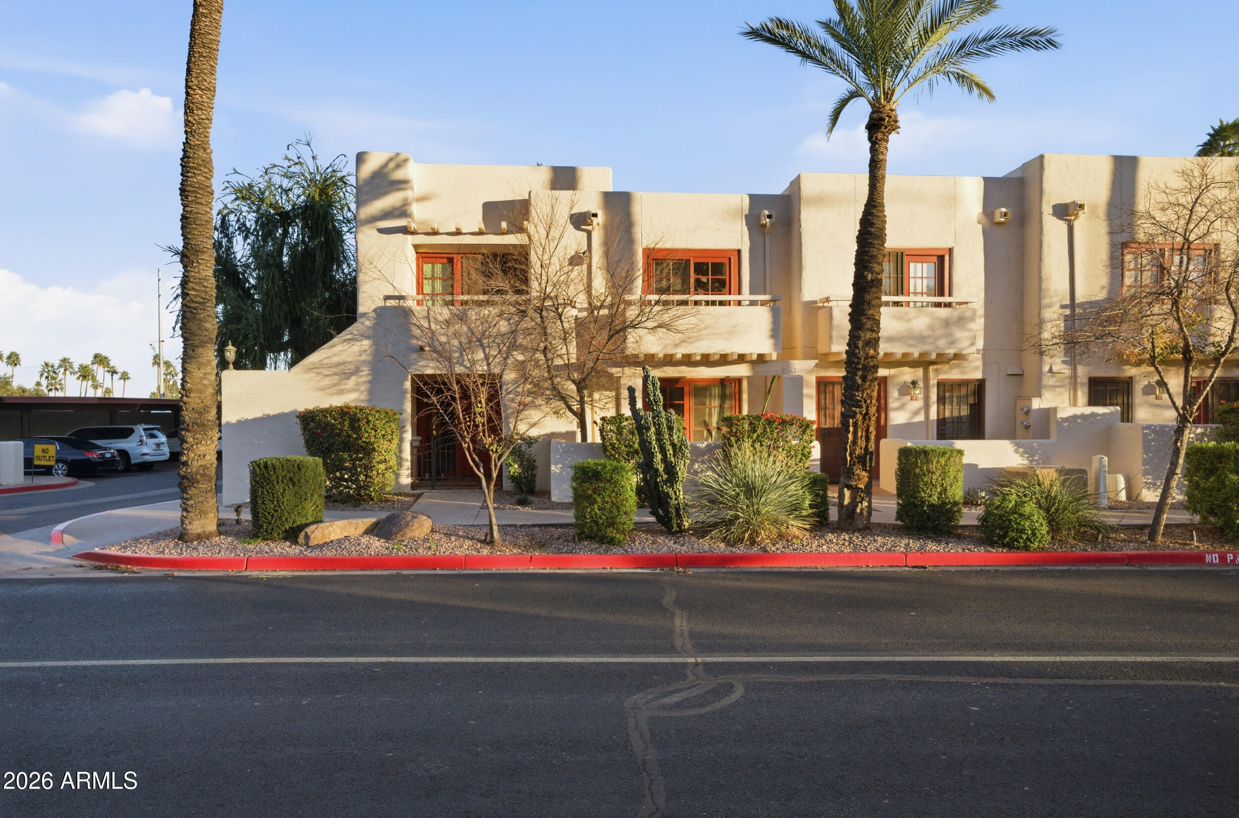 6150 North Scottsdale Road, Unit 52 Paradise Valley, AZ 85253 - Photo 17 of 24 a view of street with tall buildings