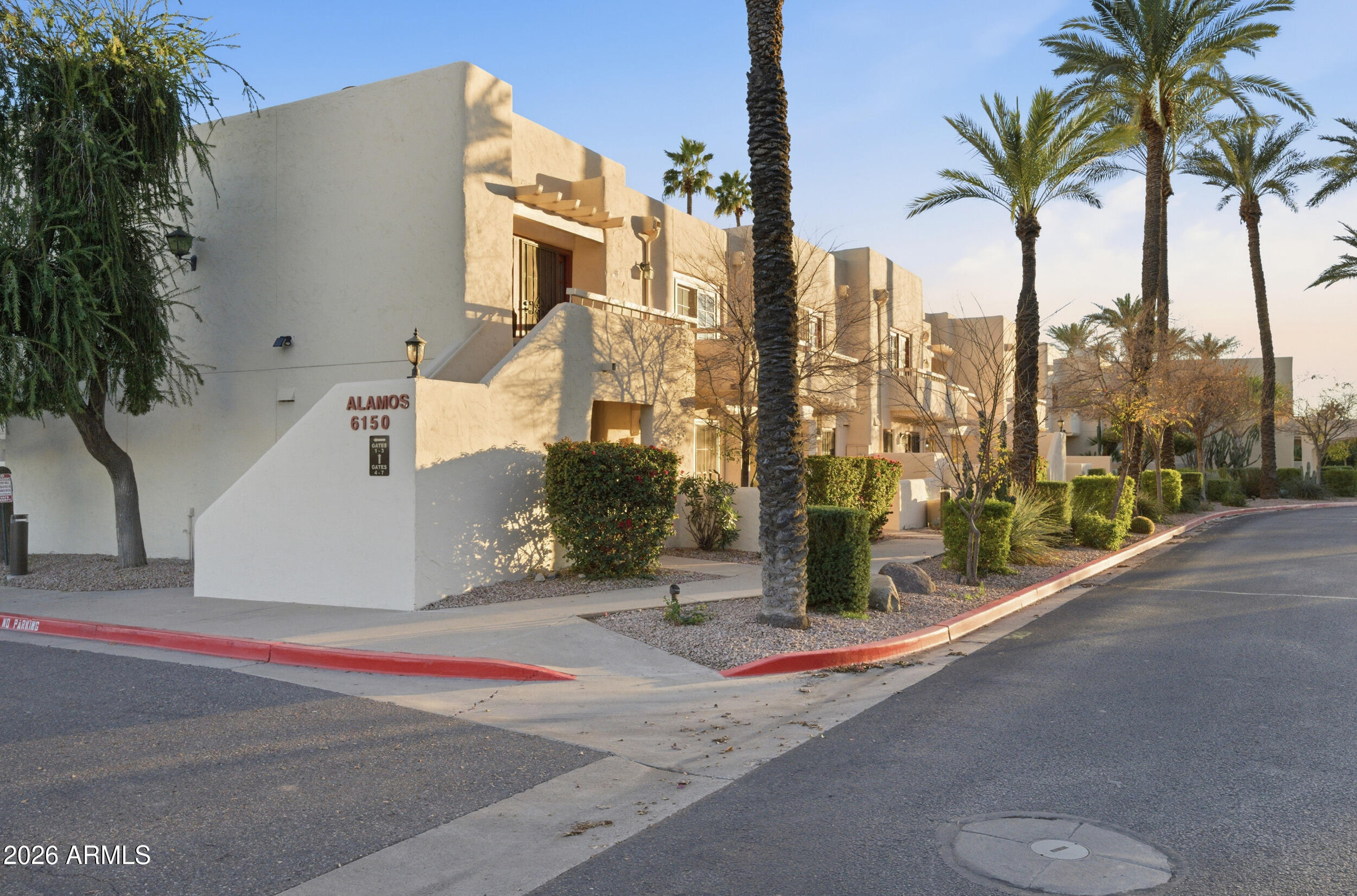 6150 North Scottsdale Road, Unit 52 Paradise Valley, AZ 85253 - Photo 18 of 24 a view of a street with palm trees
